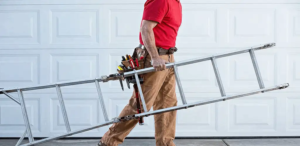 Garage door repair technician arriving with tools and ladder in Dallas, TX
