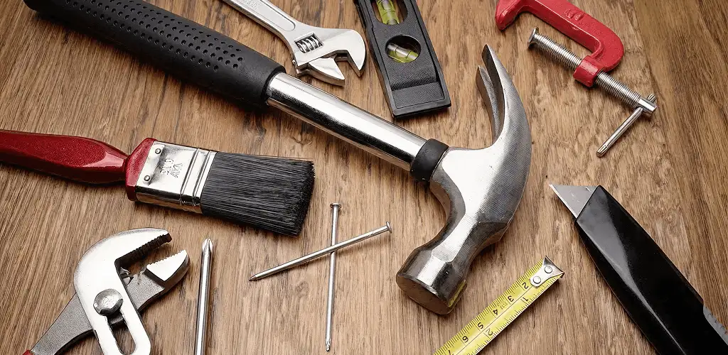 Handyman tools laid out for home repair and maintenance work in Dallas, TX